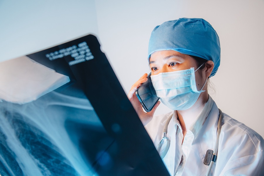 doctor with phone