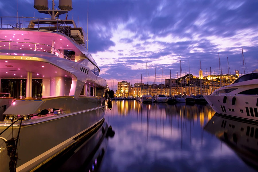 The Port of Cannes, France, illuminated at night.