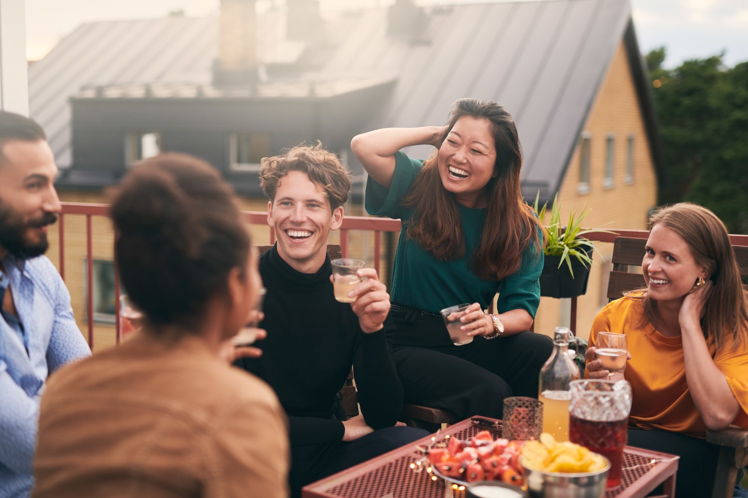Group of friends dining together outside