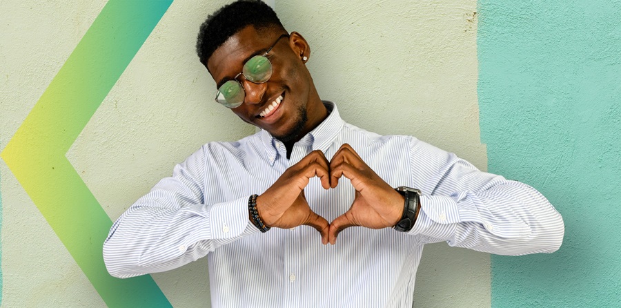 Man forming a heart with his hands